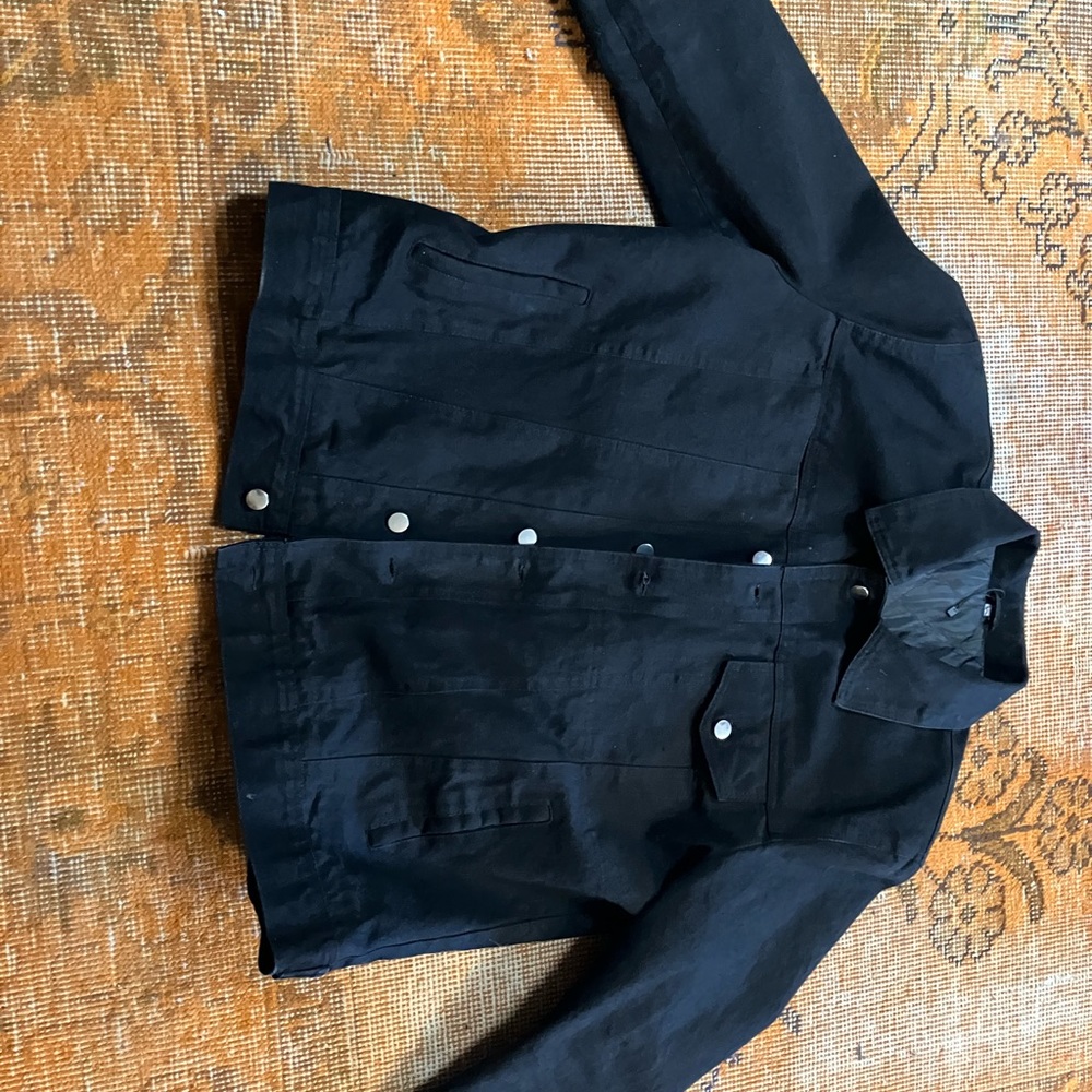 Black trucker jacket as worn by ‘Rip’ on the series Yellowstone.